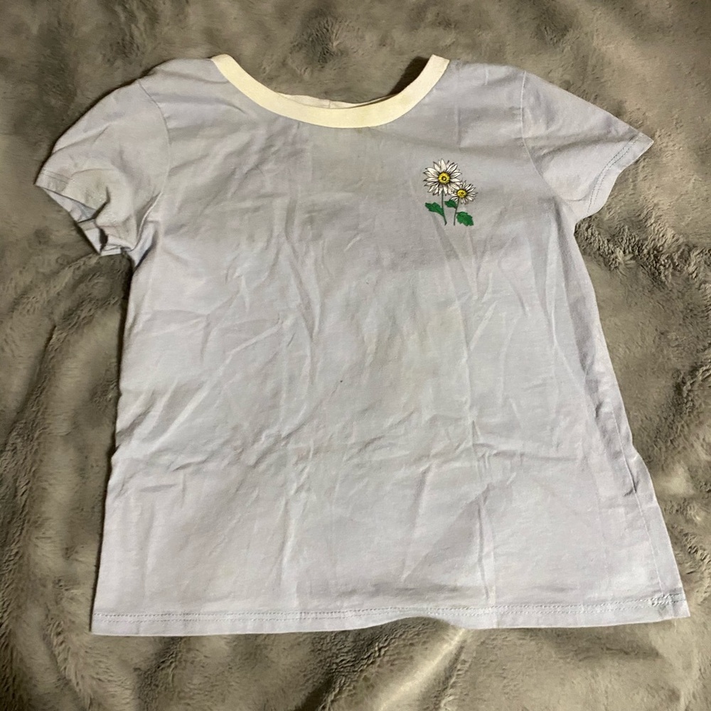 Tilly’s light blue tee with flower